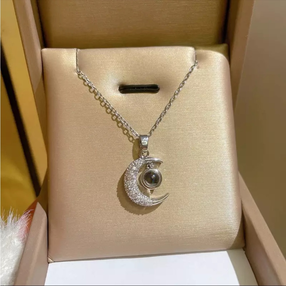 Star and moon I love you necklace.